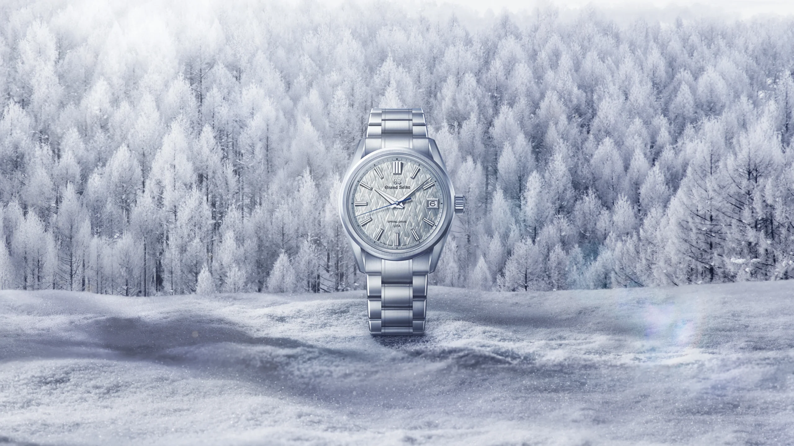 Grand Seiko SLGB003 Spring Drive U.F.A. Evolution 9 with frosted blue dial.